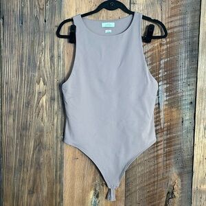 Babaton Contour sold at Aritzia bodysuit in mauve size XL